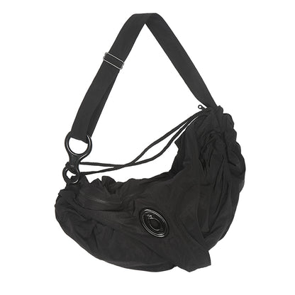 dumpling-shaped cross body bag